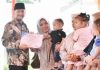 Momentum PID 2026, Pemkab Bireuen Beri Penghargaan kepada 50 Anak Berstatus Imunisasi Dasar Lengkap