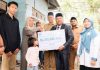 Bupati Bireuen Serahkan Santunan JKM BPJS Ketenagakerjaan Rp267 Juta, Anak Pekerja Meninggal Dapat Beasiswa hingga Perguruan Tinggi