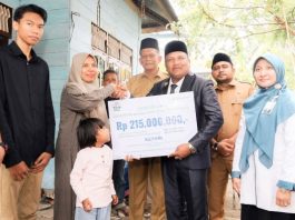 Bupati Bireuen Serahkan Santunan JKM BPJS Ketenagakerjaan Rp267 Juta, Anak Pekerja Meninggal Dapat Beasiswa hingga Perguruan Tinggi