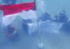 Polairud Polda Aceh Kibarkan Bendera Merah Putih di Dasar Laut Krueng Raya